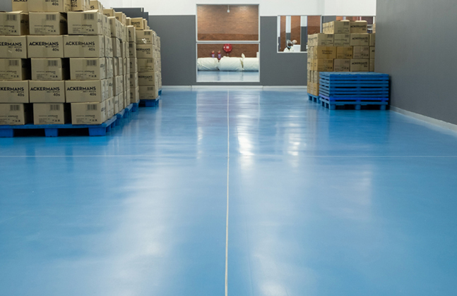 L’il Masters’ New Factory Floor Combines Colour with Cleanliness